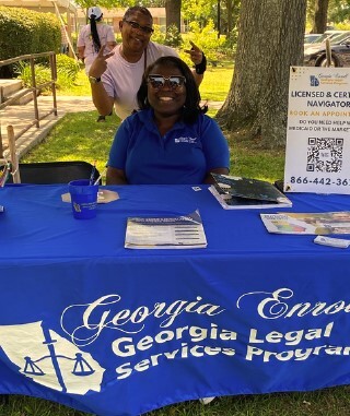 People at the table for the Georgia Legal Services Program.