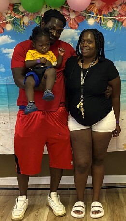 A family at the Family Fun Day Event.