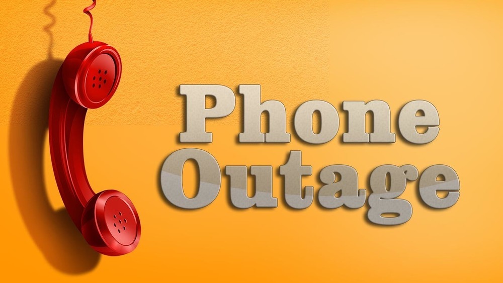 Red telephone with text Phone Outage. 